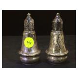 Pair of Sterling  weighted Duchin Creation