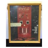 Framed controversial Coca-Cola picture , 9 by 11
