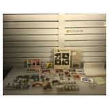 Assortment of vintage Beatles buttons, pictures