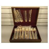 Set of flatware on wooden crate