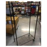 Brown rolling Rack w/2 shelves, 66in tall