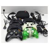 Assorted Video Game Controllers, Power cables and