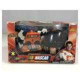 NASCAR road champs RC car in box.