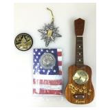 Collector tokens, ornament and guitar figure desk