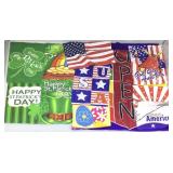 Open sign flag and assorted garden flags.