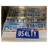 9 metal vehicle license plates. Nevada.