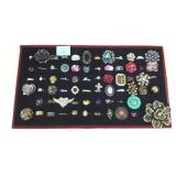 Jewelry tray with contents. Fashion rings.