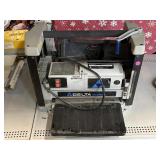 Delta Shopmaster Woodworking Thickness Planer.