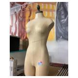 Mannequin torso display. Fabric covered female