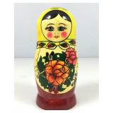 Hand painted nesting doll made in Russia.