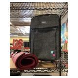 Rolling tote and yoga mat.