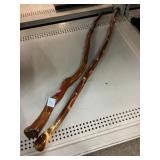 Wood carved walking sticks