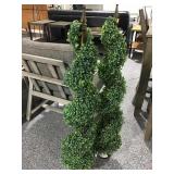2 faux topiary plants.
