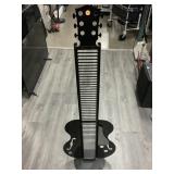Atlantic guitar shape cd Rack, approx 51in tall