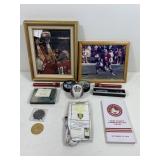 Mixed sports lot with autographed pucks