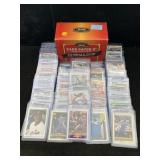 Mixed sports card lot in cases