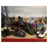 Assorted womanï¿½s heels, boots, wedges, and more
