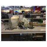 Assorted home decor, animal figures, vases,