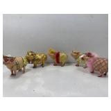 5 fancy pig figure coin banks.