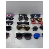 Assorted sunglasses eyewear.