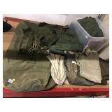 Military clothing and duffle bags. Jackets,