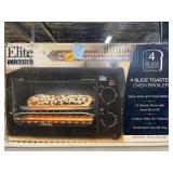 NIB 4 Slice Toaster Oven Broiler.