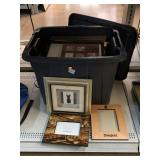Bin of household frames and wall art. Assorted