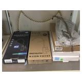 Assorted New Plumbing Fixtures. Faucets, and