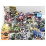 Collection of bagged paper crowns, kids meal toys