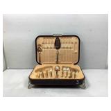 Community flatware in decorative storage box.