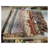 2 woven fabric rugs.