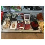 Assorted wigs and curtain drapes and panels.