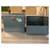 2 metal storage boxes.