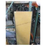 Peg board in metal frame, approx 24x70in