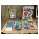 Craft beads and book.