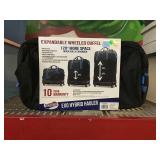 Expandable wheeled duffle bag.