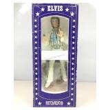 Elvis collector decanter in box.