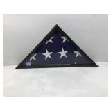American flag in wooden display case w/bullet