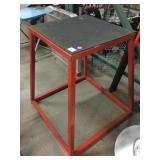 Red metal plyometric jump box for training,