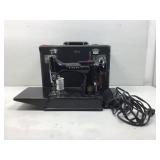 Antique portable Singer sewing machine