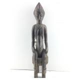 Senufo female Maternity figure seated on stool