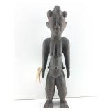 This is a Yoruba maternity statue from Nigeria.