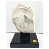 This object is a fragment of ancient marble
