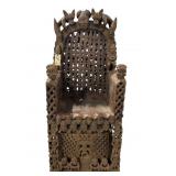 This is a hand carved African tribal chair