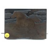 This is a vintage copper plated embossed horse