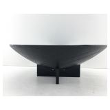 This item is a glossy black textured decorative