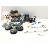 Mixed sports lot with autographed pucks