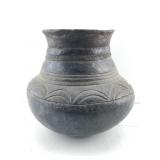 An African pottery vessel , specifically