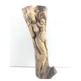 This item is a hand carved wooden statue of a