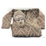 Kuba costume and mask adorned in beads and sea
